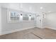Bright living room with large windows, white walls, and modern flooring at 1015 Deckner Sw Ave, Atlanta, GA 30310
