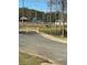 Community park featuring a baseball field, playground, picnic shelter and walking path at 4511 Twinberry Dr, Powder Springs, GA 30127