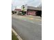 Street view featuring Rooted Trading Co. building and crosswalk at 4517 Twinberry Dr, Powder Springs, GA 30127