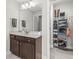 Bathroom features dark cabinets, granite counters and access to a walk-in closet at 3330 Harmony Hill Rd, Kennesaw, GA 30144