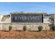 River Oaks is a new construction neighborhood with a stone monument sign and landscaping at the entrance at 313 Chattahoochee Cir, Locust Grove, GA 30248