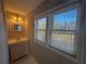 Bathroom featuring a single vanity sink, mirror, and natural lighting at 854 Fayetteville Se Rd, Atlanta, GA 30316