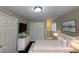 Cozy bedroom with a comfortable bed, dresser, closet and a view to ensuite bathroom at 854 Fayetteville Se Rd, Atlanta, GA 30316