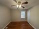 Bedroom featuring hardwood floors, ceiling fan, and window for natural light at 854 Fayetteville Se Rd, Atlanta, GA 30316