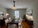 Dining room featuring dark wood table with seating for six and modern decor at 854 Fayetteville Se Rd, Atlanta, GA 30316