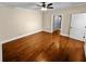 Bedroom with hardwood floors and neutral paint at 1054 Sw Morgan Garner Dr, Lilburn, GA 30047