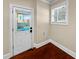 Mud room features tile flooring, a door to outside, and a window at 1054 Sw Morgan Garner Dr, Lilburn, GA 30047