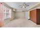 Basement bedroom with carpeting, modern closet storage, and natural light at 3413 Talking Creek Ct, Conyers, GA 30094