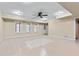 Spacious basement featuring tile flooring, recessed lighting, and multiple windows for natural light at 3413 Talking Creek Ct, Conyers, GA 30094