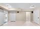 Basement featuring hardwood floors and multiple access points to other areas of the home at 3413 Talking Creek Ct, Conyers, GA 30094