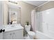 Charming bathroom features a shower/tub combo and a white single sink vanity at 3413 Talking Creek Ct, Conyers, GA 30094