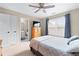 Comfortable bedroom with ceiling fan, closet, and an ensuite bathroom at 3413 Talking Creek Ct, Conyers, GA 30094