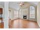 A large, well lit living room with a fireplace and a cathedral ceiling at 3413 Talking Creek Ct, Conyers, GA 30094