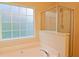 Bathroom with tub and separate shower stall at 2024 Appaloosa Way, Conyers, GA 30012