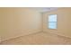 Small bedroom with carpeted floor and window at 2024 Appaloosa Way, Conyers, GA 30012