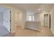 Second floor hallway features modern flooring, a laundry closet, and linen storage at 4521 Twinberry Dr, Powder Springs, GA 30127