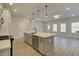 Modern kitchen with large island and stainless steel appliances at 4521 Twinberry Dr, Powder Springs, GA 30127