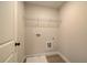 Laundry room with shelving and flooring at 4521 Twinberry Dr, Powder Springs, GA 30127