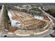 An aerial view shows a new construction site, roadways, and neighborhood at 4529 Twinberry Dr, Powder Springs, GA 30127