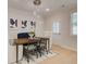 Elegant dining room featuring a wood table and chairs at 4529 Twinberry Dr, Powder Springs, GA 30127