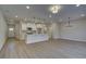 Open concept kitchen and dining area with hardwood floors at 4529 Twinberry Dr, Powder Springs, GA 30127