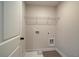 Convenient laundry room with ample space for washer, dryer, and storage at 4529 Twinberry Dr, Powder Springs, GA 30127