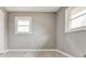 Inviting bedroom with modern flooring, a bright window, and a soothing gray color palette at 2216 Golden Dawn Sw Dr, Atlanta, GA 30311