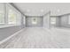 Spacious living room with recessed lighting and neutral gray flooring at 2216 Golden Dawn Sw Dr, Atlanta, GA 30311