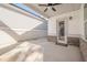 Covered patio with concrete floor and exterior lighting with brick base and siding at 104 Ivey Way, Woodstock, GA 30188