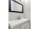 Modern bathroom with updated vanity and mirror at 308 Spring Heights Lane # 308, Smyrna, GA 30080