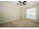 Bright bedroom with neutral carpeting and ceiling fan at 308 Spring Heights Lane # 308, Smyrna, GA 30080