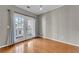 Hardwood floor dining area with balcony access at 308 Spring Heights Lane # 308, Smyrna, GA 30080