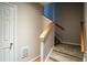 Indoor carpeted stairs with wooden handrail at 308 Spring Heights Lane # 308, Smyrna, GA 30080