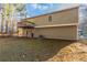 House's backyard view, deck, and wooded area at 5910 Rock Rd, Union City, GA 30291