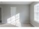 Bright bedroom with a closet and window at 5910 Rock Rd, Union City, GA 30291