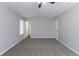 Large bedroom with two doors and a window at 5910 Rock Rd, Union City, GA 30291