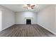 Living room with fireplace, vaulted ceiling and ceiling fan at 5910 Rock Rd, Union City, GA 30291