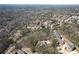 Aerial view of a residential neighborhood with houses nestled among trees at 2727 Jamerson Rd, Marietta, GA 30066