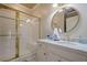Bathroom with walk-in shower, marble vanity, and large mirror at 2727 Jamerson Rd, Marietta, GA 30066