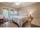 Cozy bedroom with a queen-size bed and access to a deck at 2727 Jamerson Rd, Marietta, GA 30066