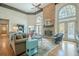 Spacious Gathering room with a stone fireplace and hardwood floors at 2727 Jamerson Rd, Marietta, GA 30066