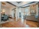 Open living space with a stone fireplace and hardwood floors at 2727 Jamerson Rd, Marietta, GA 30066