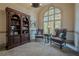 Cozy office with a built-in bookcase and two wingback chairs at 2727 Jamerson Rd, Marietta, GA 30066