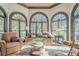Sunlit sitting room featuring a comfy sofa and stunning views at 2727 Jamerson Rd, Marietta, GA 30066