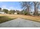 Expansive backyard features a shed and mature trees at 85 Blue Jay Dr, Covington, GA 30016