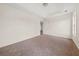 Bedroom featuring a tray ceiling, carpet flooring, and natural light at 85 Blue Jay Dr, Covington, GA 30016