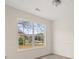 Well-lit dining room with large window views at 85 Blue Jay Dr, Covington, GA 30016