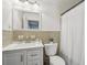 Updated bathroom with white vanity, beige tile, and shower/tub combo at 2773 Townley Cir, Atlanta, GA 30340