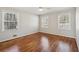 Well-lit bedroom featuring hardwood floors and multiple windows at 2773 Townley Cir, Atlanta, GA 30340