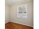 Cozy bedroom with hardwood floors and a window at 2773 Townley Cir, Atlanta, GA 30340